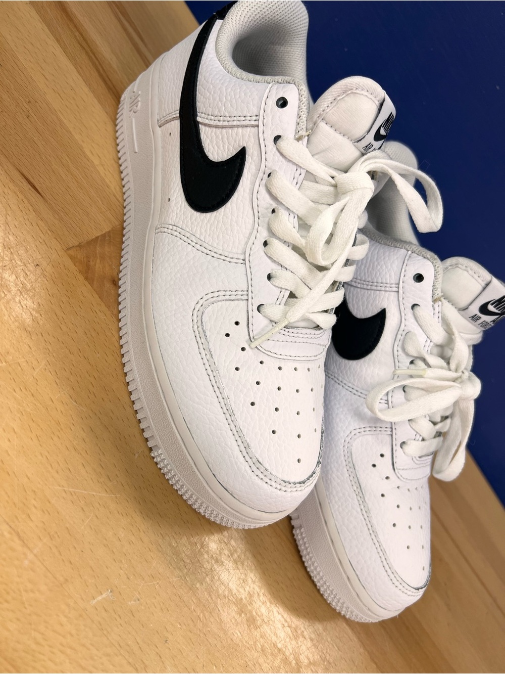 Nike White Sneakers with Black Swoosh